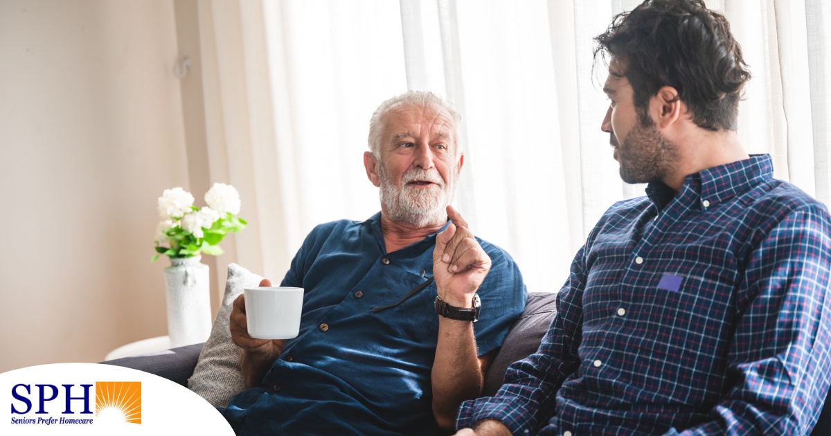 A son talks with an older parent representing the kind of communication needed to tell how aging parents are doing.